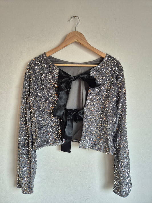 Pailettenbluse mit Schleifen